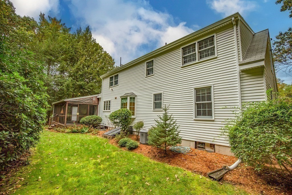 477 Wolf Swamp Road Longmeadow, MA 01106 - Photo 7 of 35 a view of a house with a yard and plants