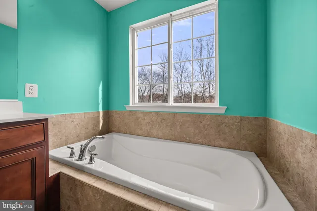 a bathroom with a bathtub