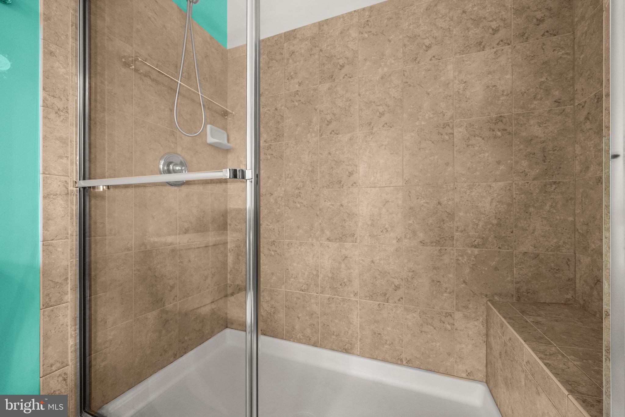 109 Gray Street Capitol Heights, MD 20743 - Photo 17 of 35 a bathroom with a bathtub