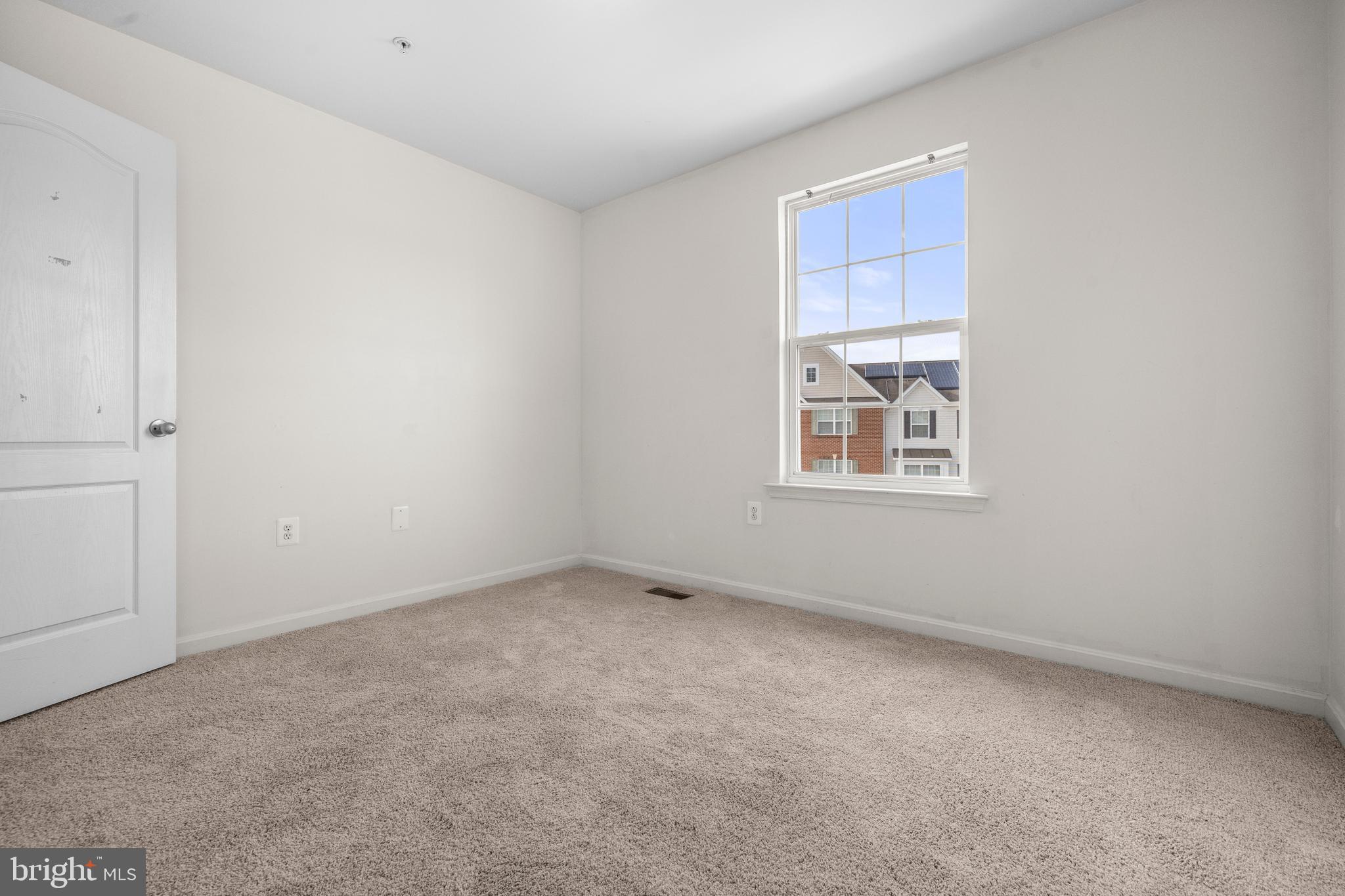 109 Gray Street Capitol Heights, MD 20743 - Photo 21 of 35 a view of an empty room with a window