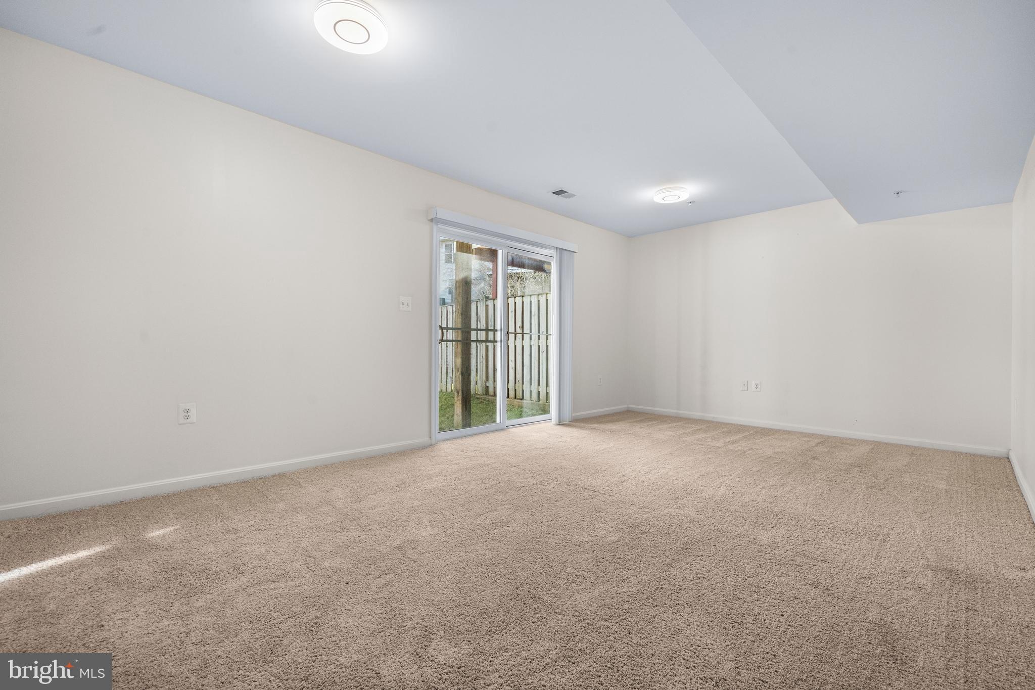 109 Gray Street Capitol Heights, MD 20743 - Photo 26 of 35 a view of an empty room with a window