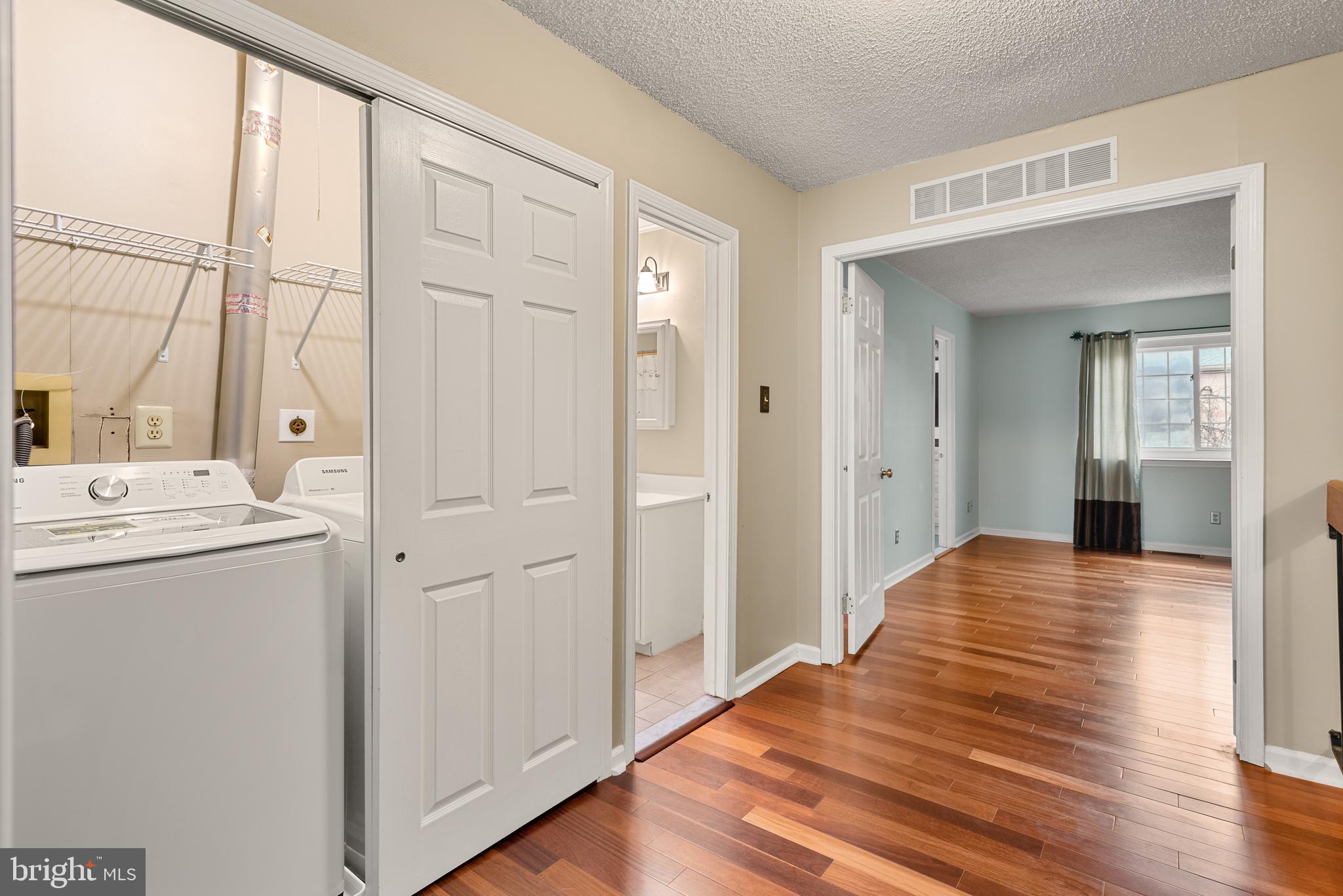 5 Lantern Lane Chesterbrook, PA 19087 - Photo 19 of 30 a view of hallway with wooden floor