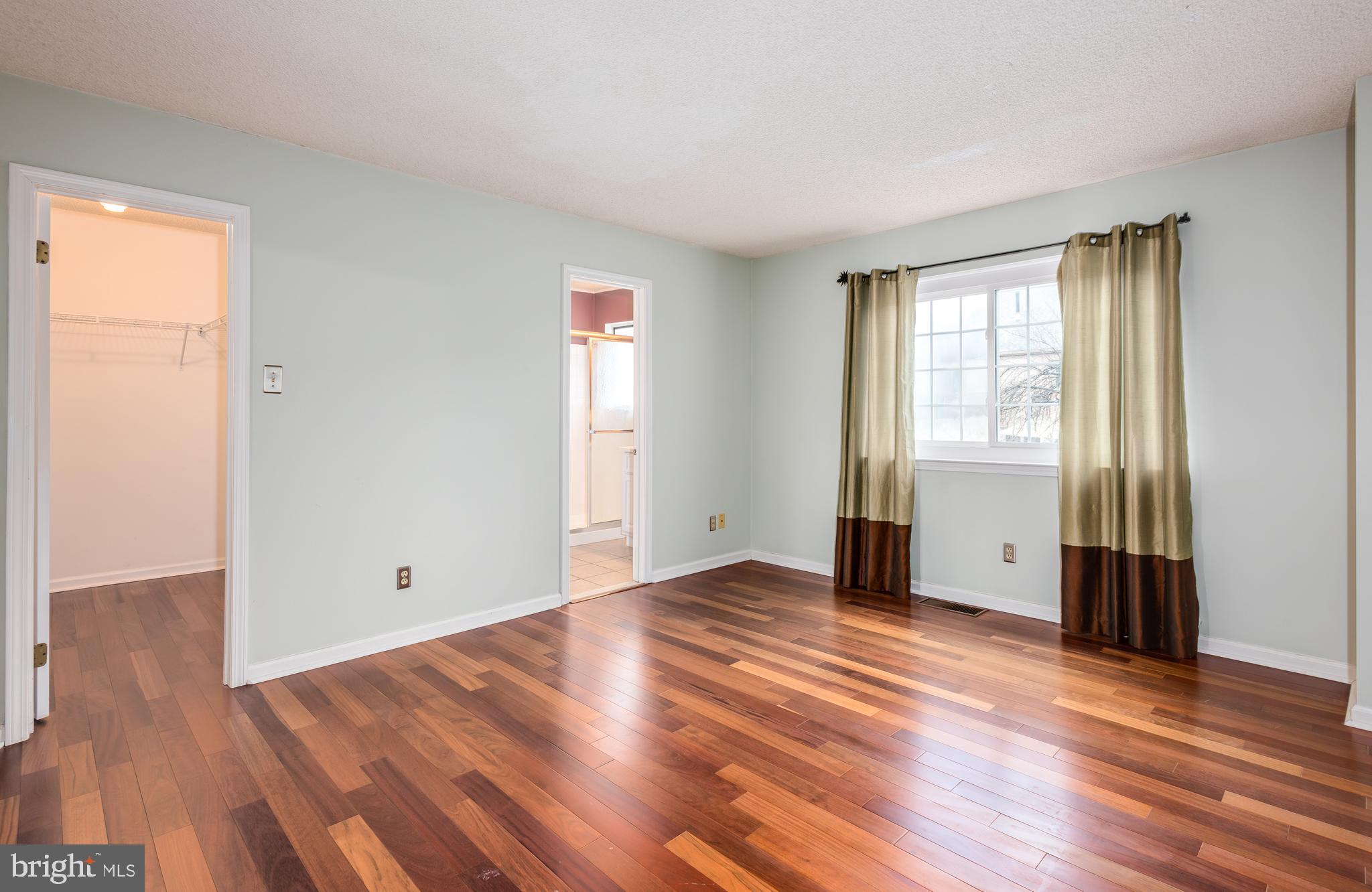 5 Lantern Lane Chesterbrook, PA 19087 - Photo 22 of 30 an empty room with wooden floor and windows