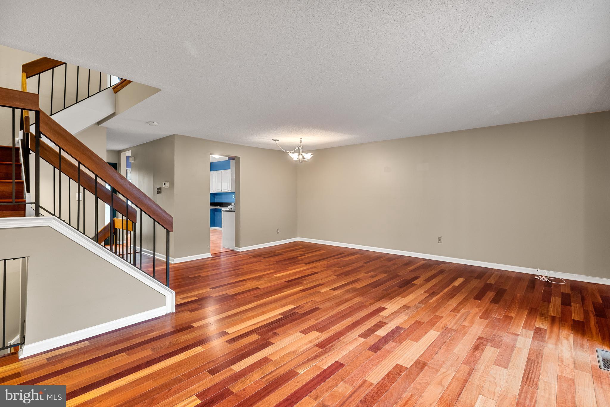 5 Lantern Lane Chesterbrook, PA 19087 - Photo 7 of 30 a view of a hallway with wooden floor and stairs