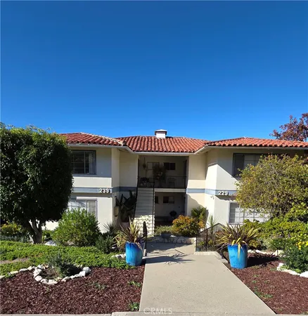 a front view of a house with a porch