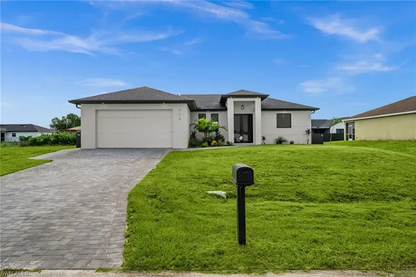 $442,500 | 409 Northwest 25th Place, Cape Coral, FL 33993