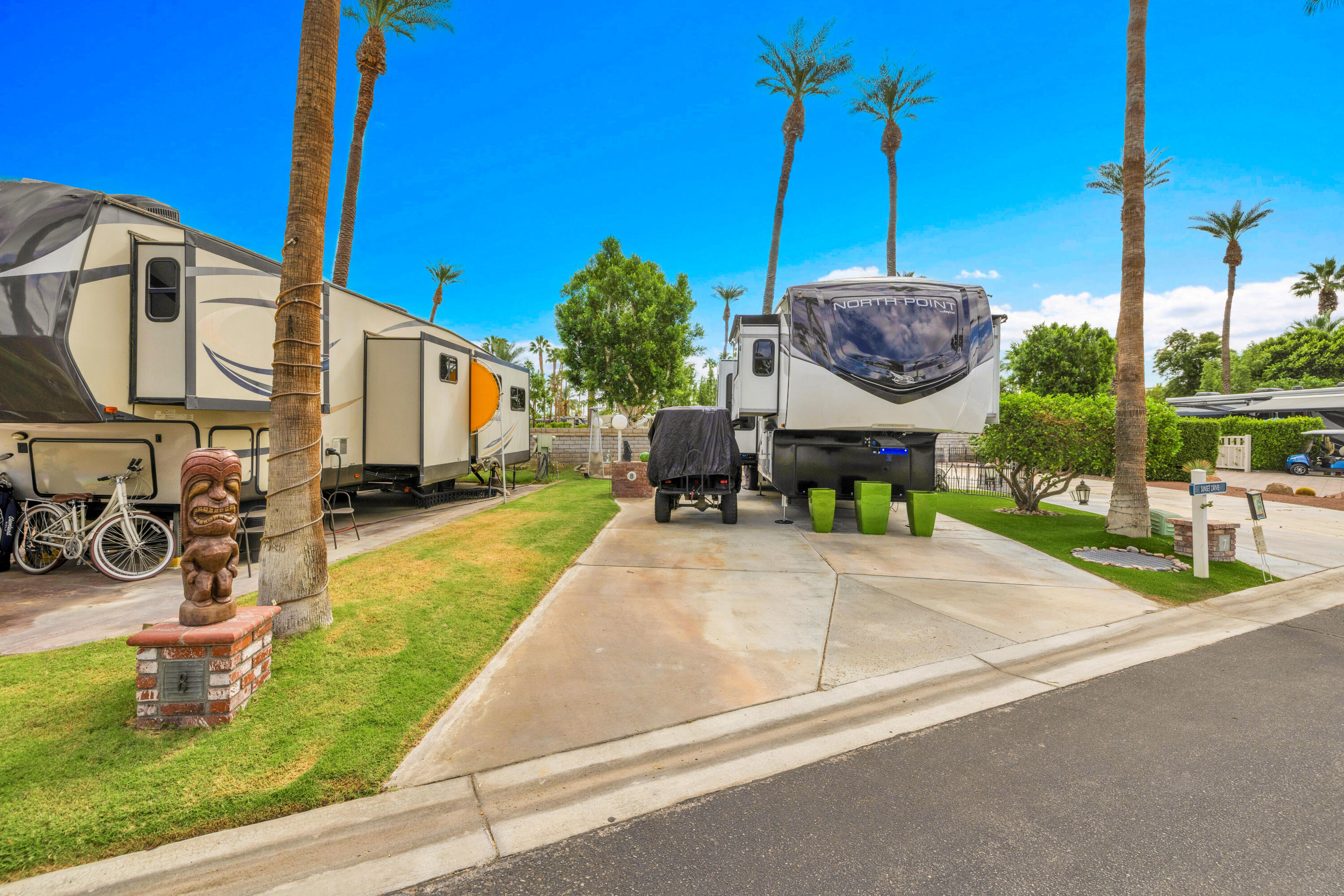 69411 Ramon Road, Unit 8 Cathedral City, CA 92234 - Photo 3 of 14 a view of a house with a patio and a yard