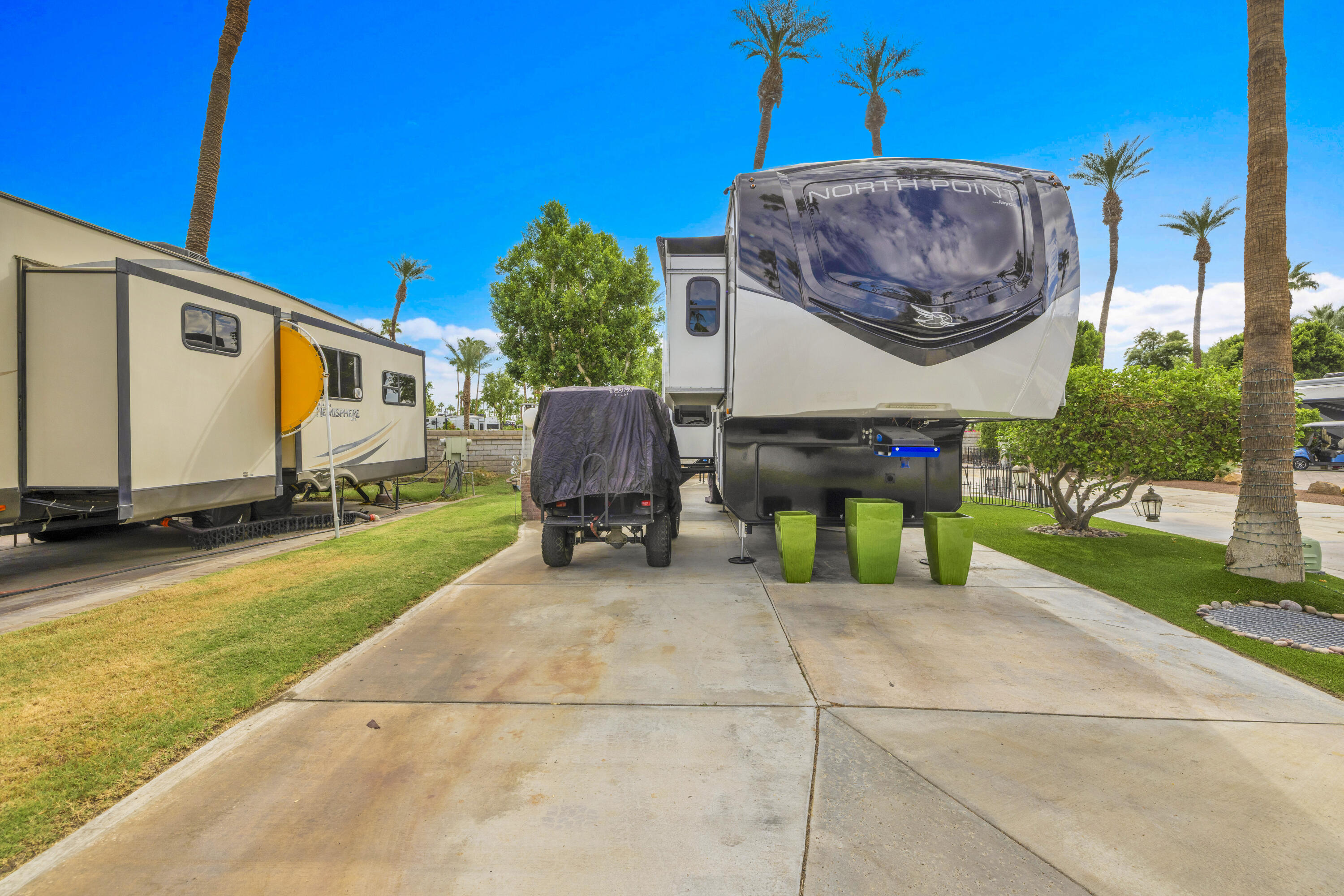 69411 Ramon Road, Unit 8 Cathedral City, CA 92234 - Photo 6 of 14 a view of a house with backyard and sitting area