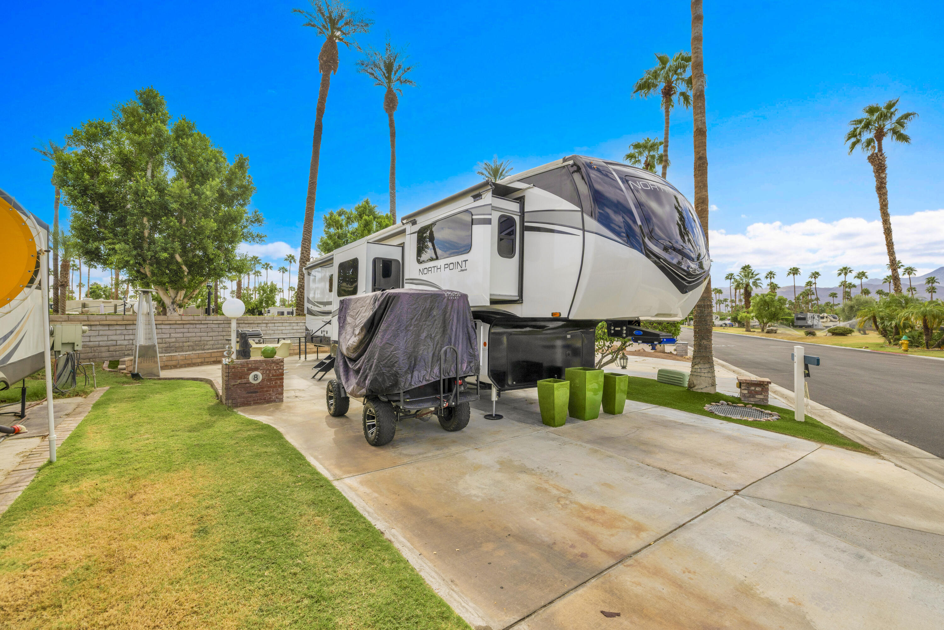 69411 Ramon Road, Unit 8 Cathedral City, CA 92234 - Photo 8 of 14 a view of a house with backyard porch and sitting area