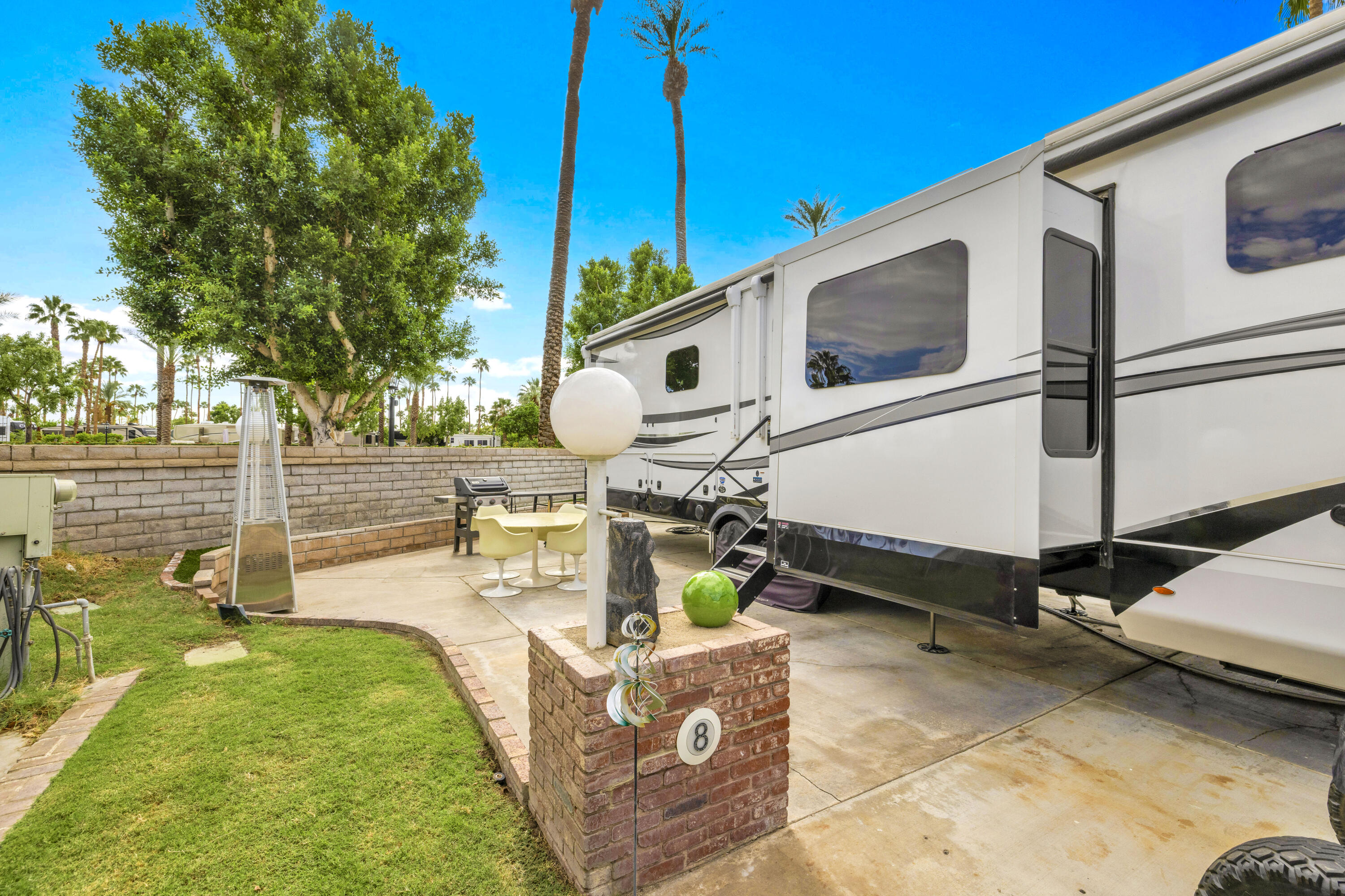 69411 Ramon Road, Unit 8 Cathedral City, CA 92234 - Photo 9 of 14 a front view of a house with garden