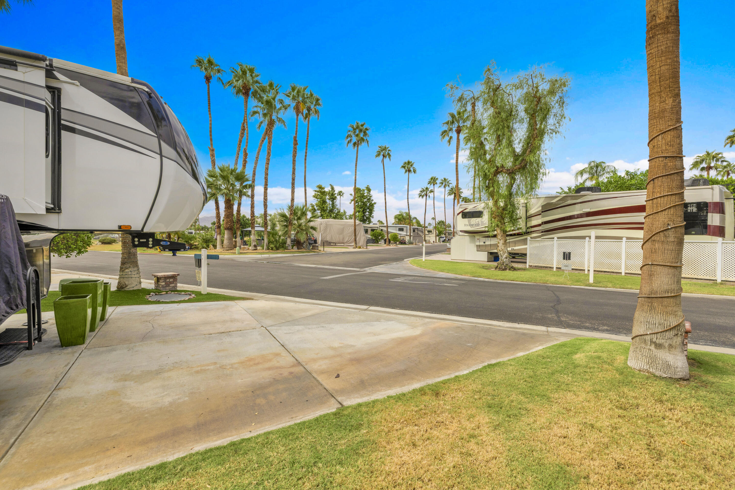 69411 Ramon Road, Unit 8 Cathedral City, CA 92234 - Photo 10 of 14 a view of a street with palm trees