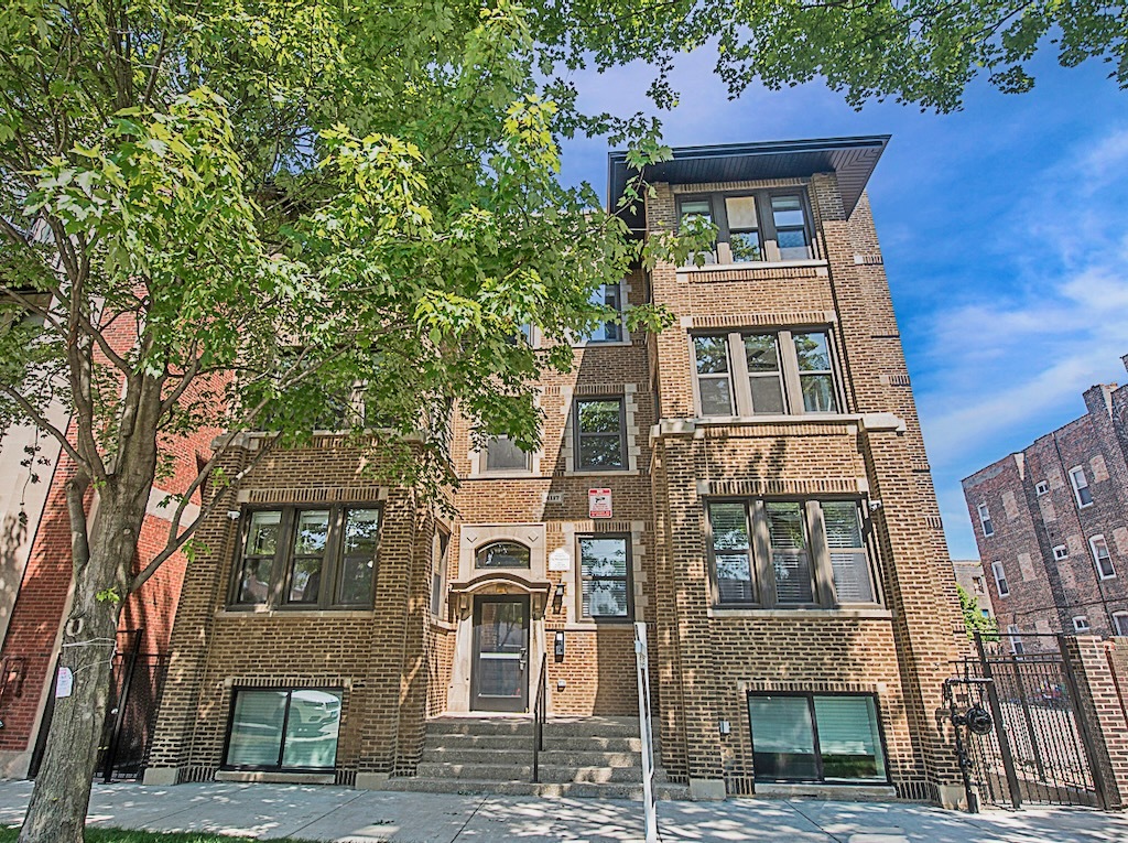4117 South Michigan Avenue, Unit 2N Chicago, IL 60653 - Photo 1 of 20 a front view of a multi story building