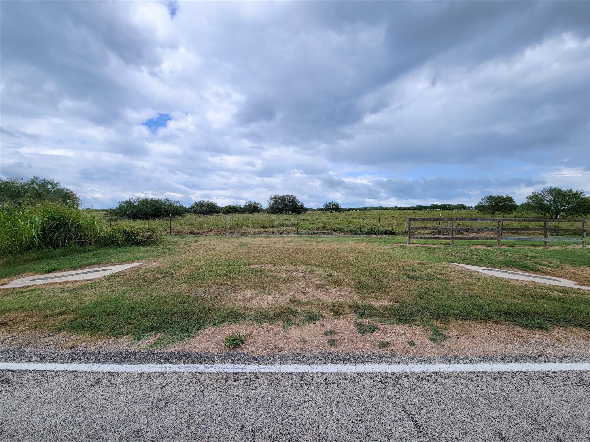 0 Fm 956 Schulenburg, TX 78956 - Photo 2 of 32 a view of a lake with a big yard and potted plants