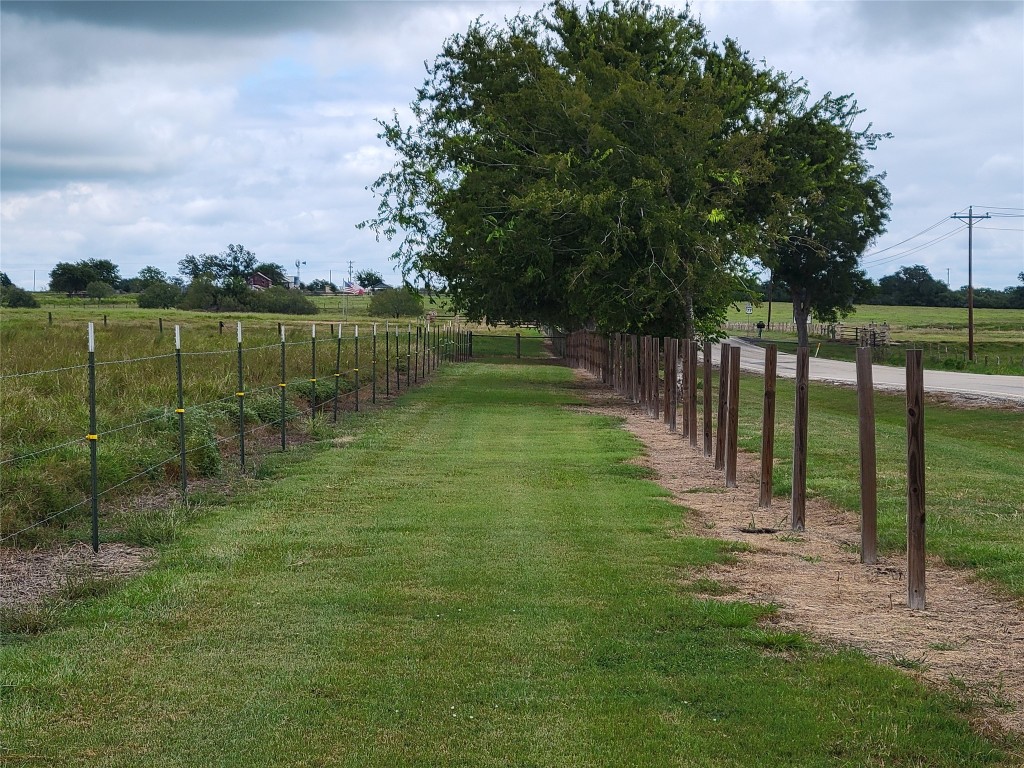 0 Fm 956 Schulenburg, TX 78956 - Photo 26 of 32 a view of a garden with lake in front of it