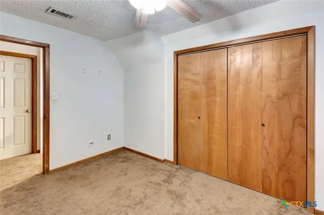 an empty room with sliding door