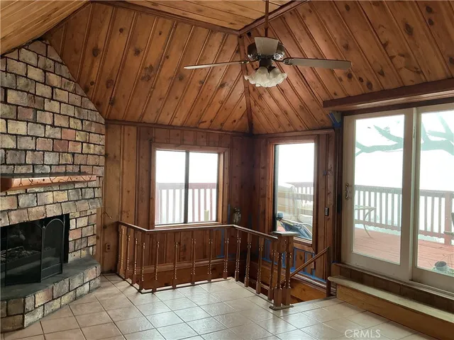 a view of an entryway with a fireplace