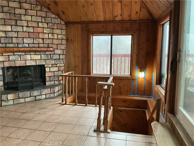a view of a balcony with chairs