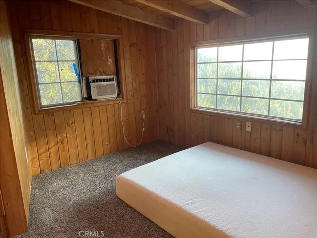 a view of workspace with table and chair