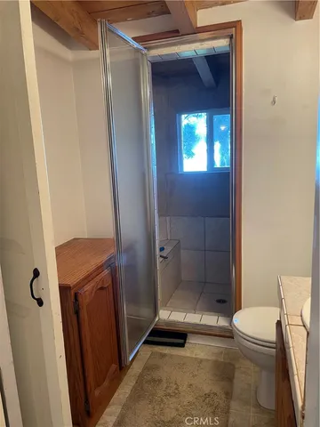 a view of an empty room with stairs