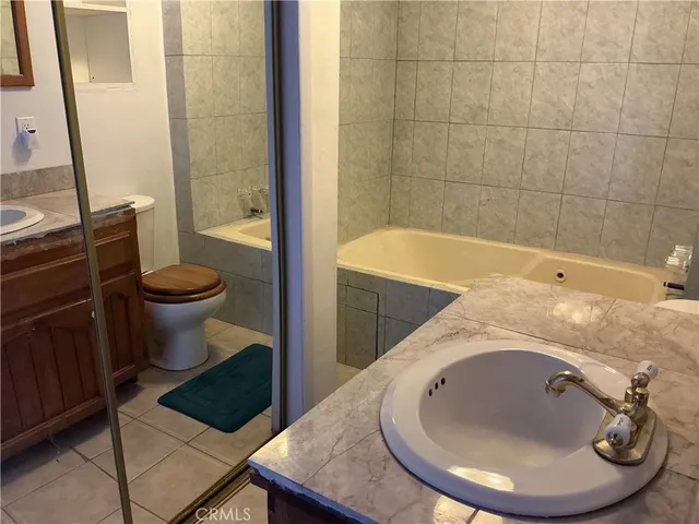 a view of a room that has a large window