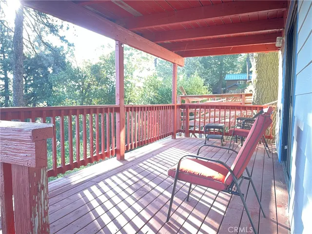 a view of a two chairs in the roof deck