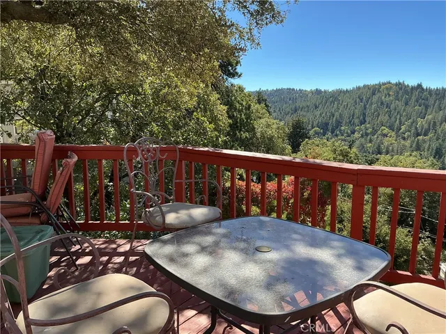 a balcony with wooden floor in outdoor space