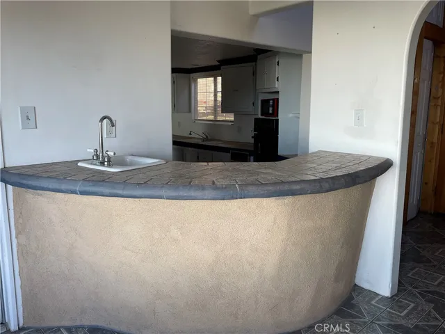 a living room with a couch and a table