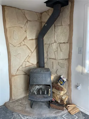 a bedroom with a bed and a mirror