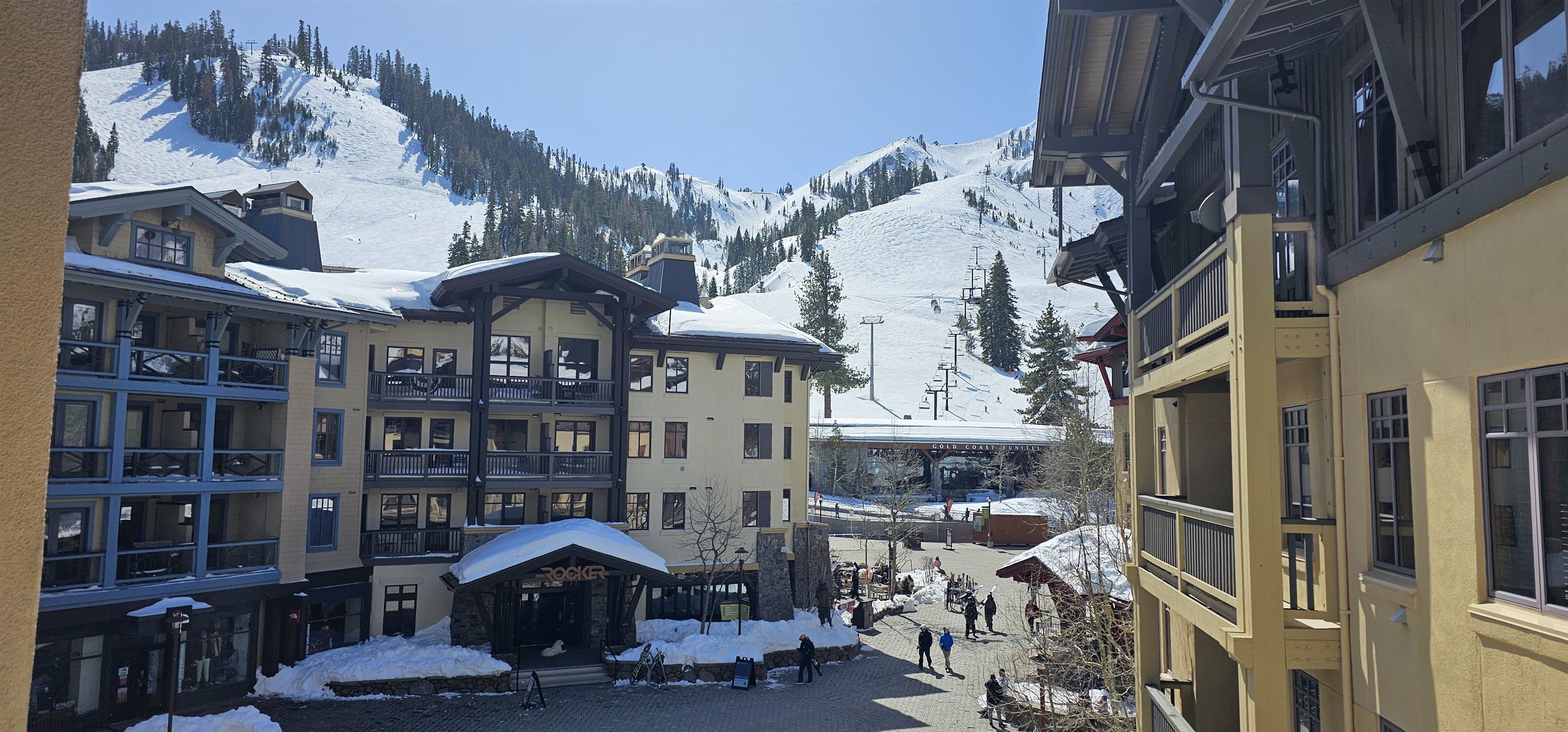 a front view of a building with sitting area
