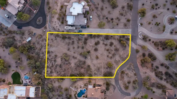 view of a bed and a painting on the wall