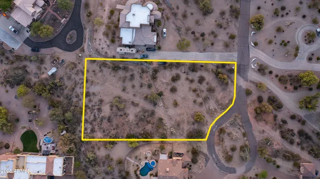 view of a bed and a painting on the wall