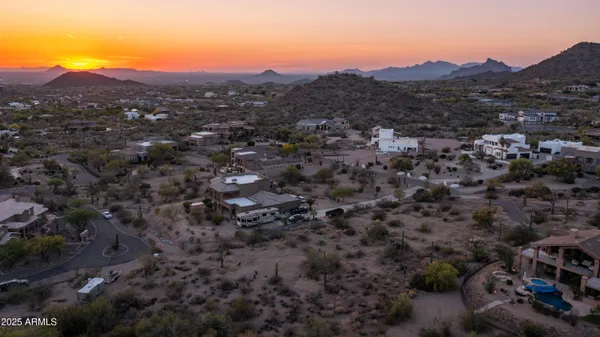 a view of a city with mountains in the background
