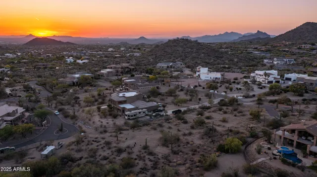 a view of a city with mountains in the background