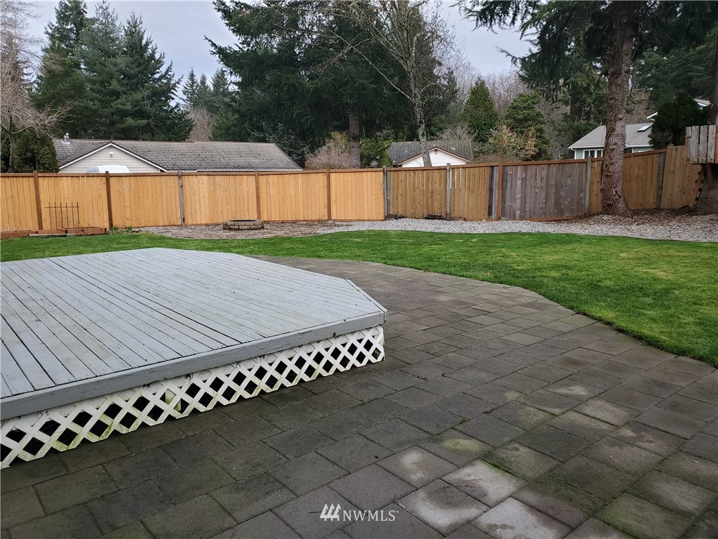 2702 Allen Road Southeast Olympia, WA 98501 - Photo 32 of 37 a view of a backyard with wooden fence