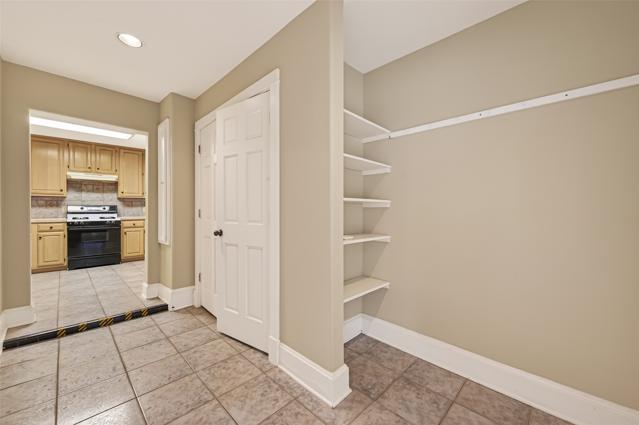 1807 Crocker Street, Unit A Houston, TX 77006 - Photo 15 of 37 From the mudroom looking toward the kitchen. The laundry is behind the double doors.