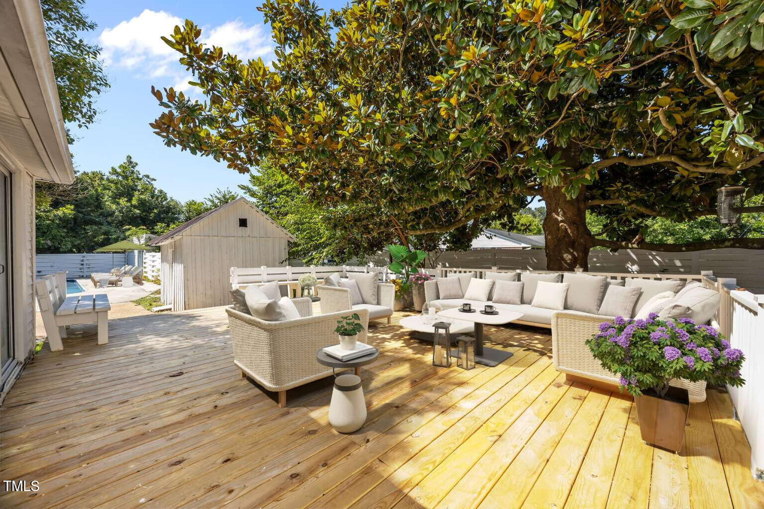 523 East Main Street Haw River, NC 27258 - Photo 21 of 25 a view of swimming pool with outdoor seating and plants