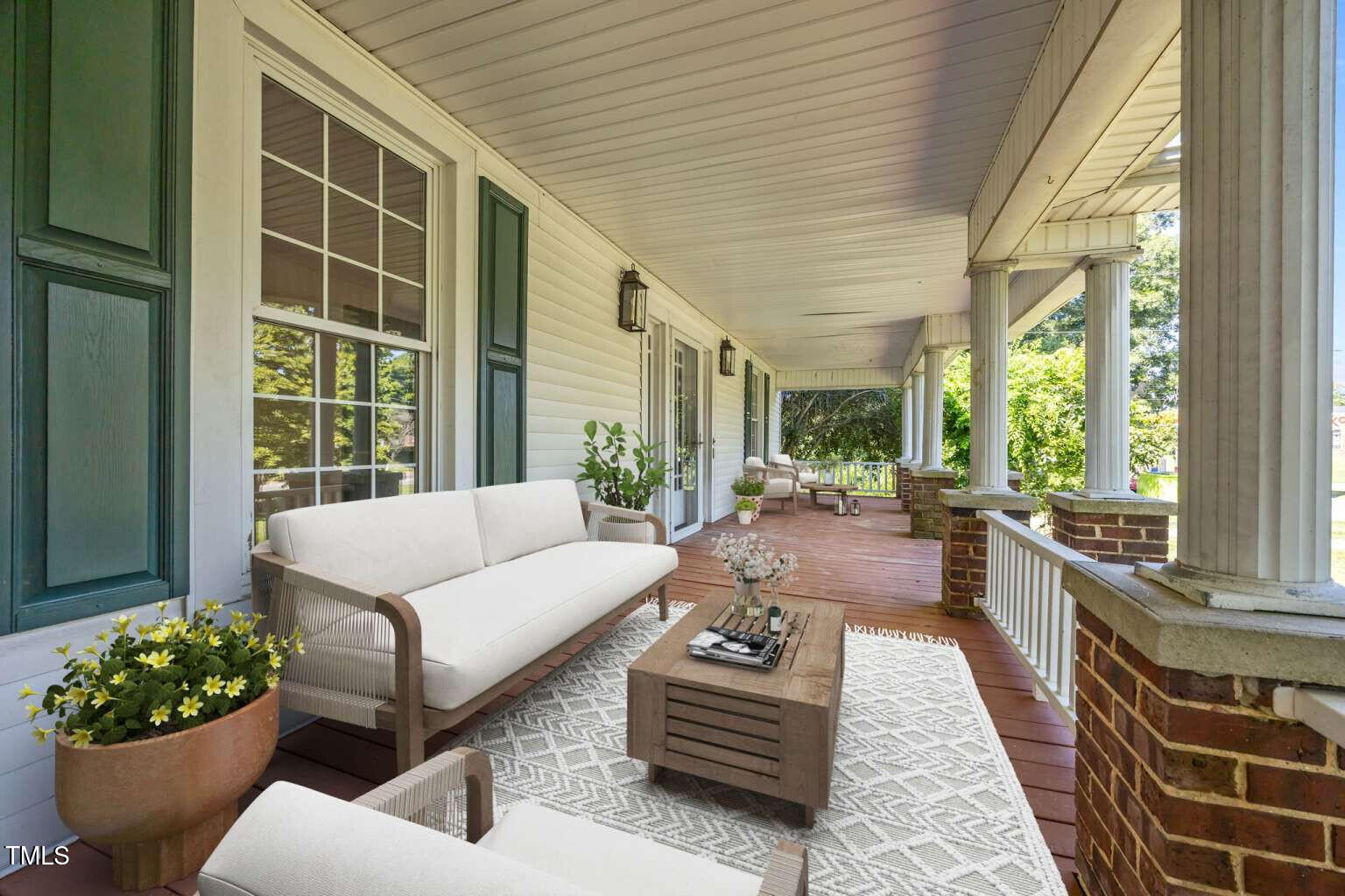 523 East Main Street Haw River, NC 27258 - Photo 24 of 25 a living room with furniture and a potted plant