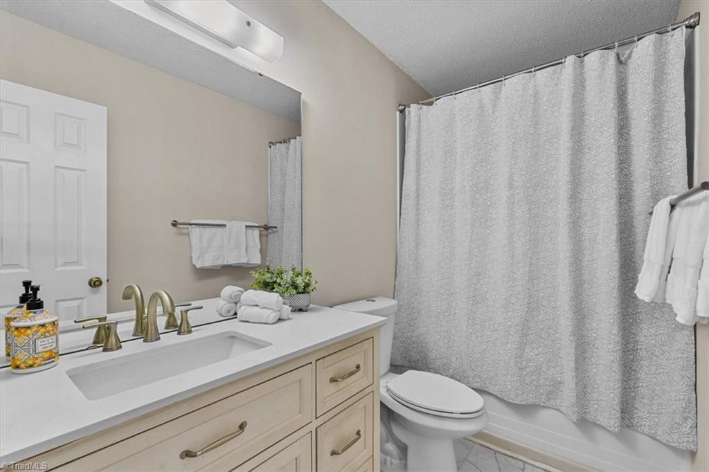 814 Guilford College Road, Unit 133 Greensboro, NC 27409 - Photo 10 of 18 Full primary bathroom with shower/tub combination