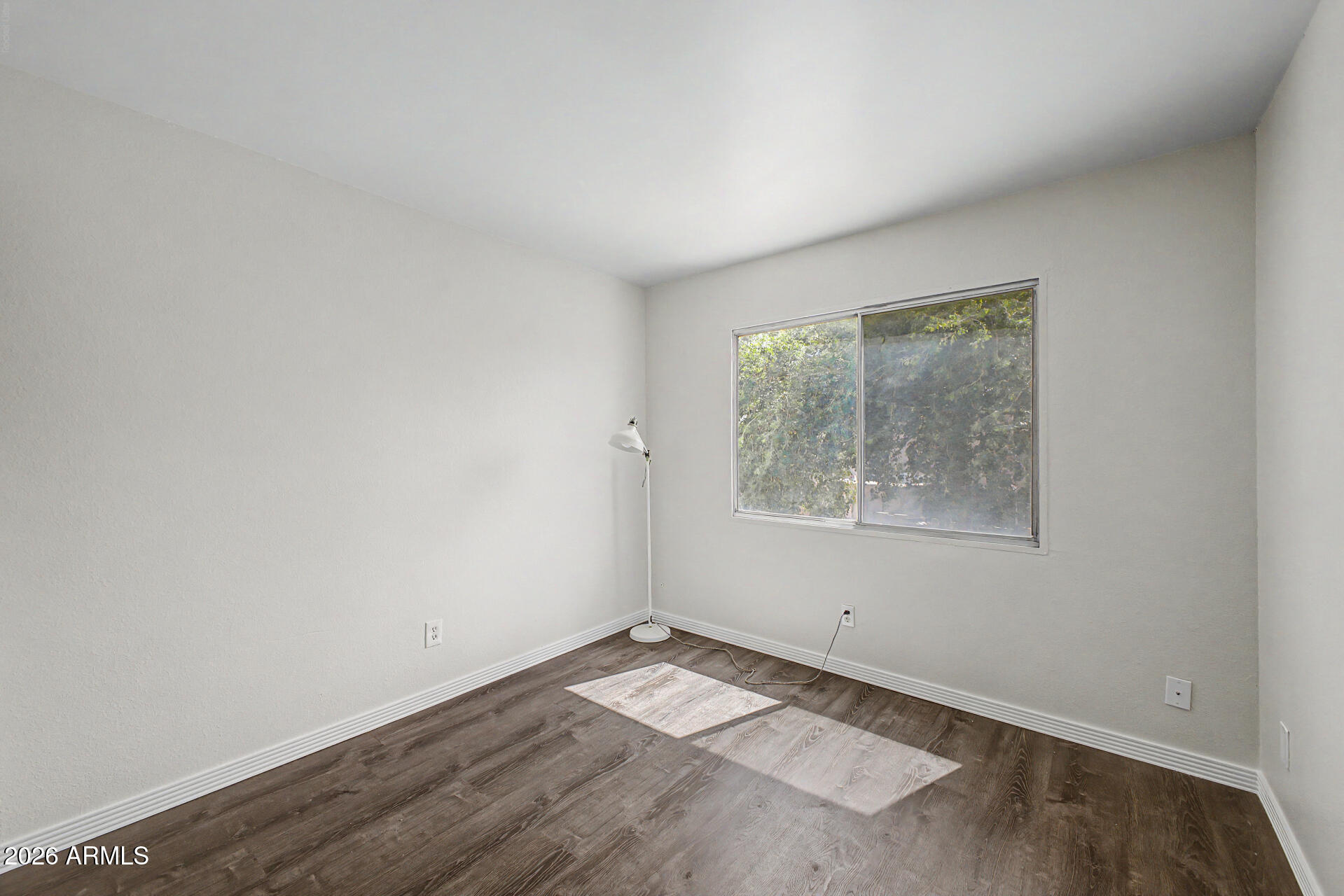 600 South Dobson Road, Unit 177 Mesa, AZ 85202 - Photo 16 of 24 an empty room with a window