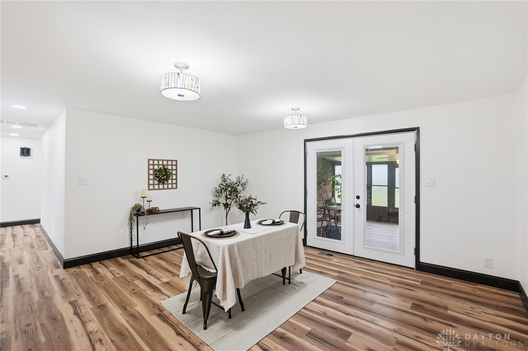 1628 Yorkshire Court Springfield, OH 45503 - Photo 15 of 47 This bright dining area features wood flooring, recessed lighting, and a charming double door entry.