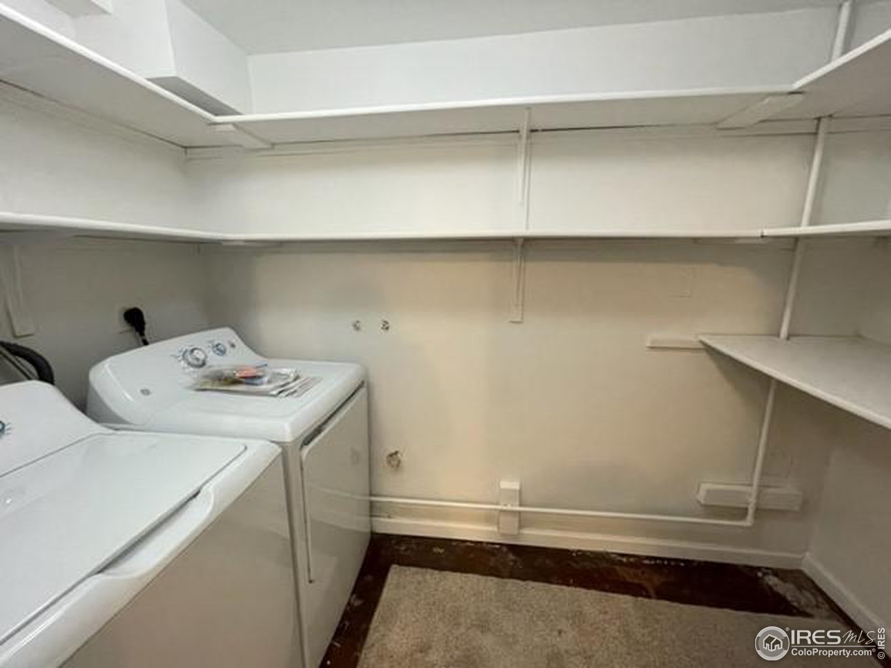 1187 Bear Mountain Drive, Unit A Boulder, CO 80305 - Photo 17 of 26 a utility room with dryer and washer