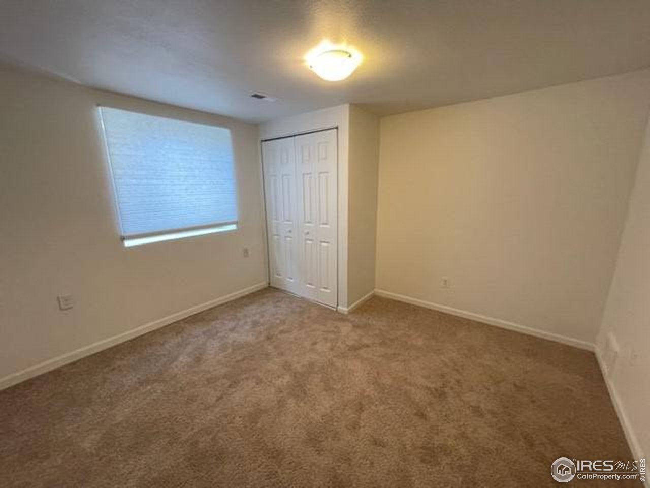 1187 Bear Mountain Drive, Unit A Boulder, CO 80305 - Photo 19 of 26 an empty room with a window