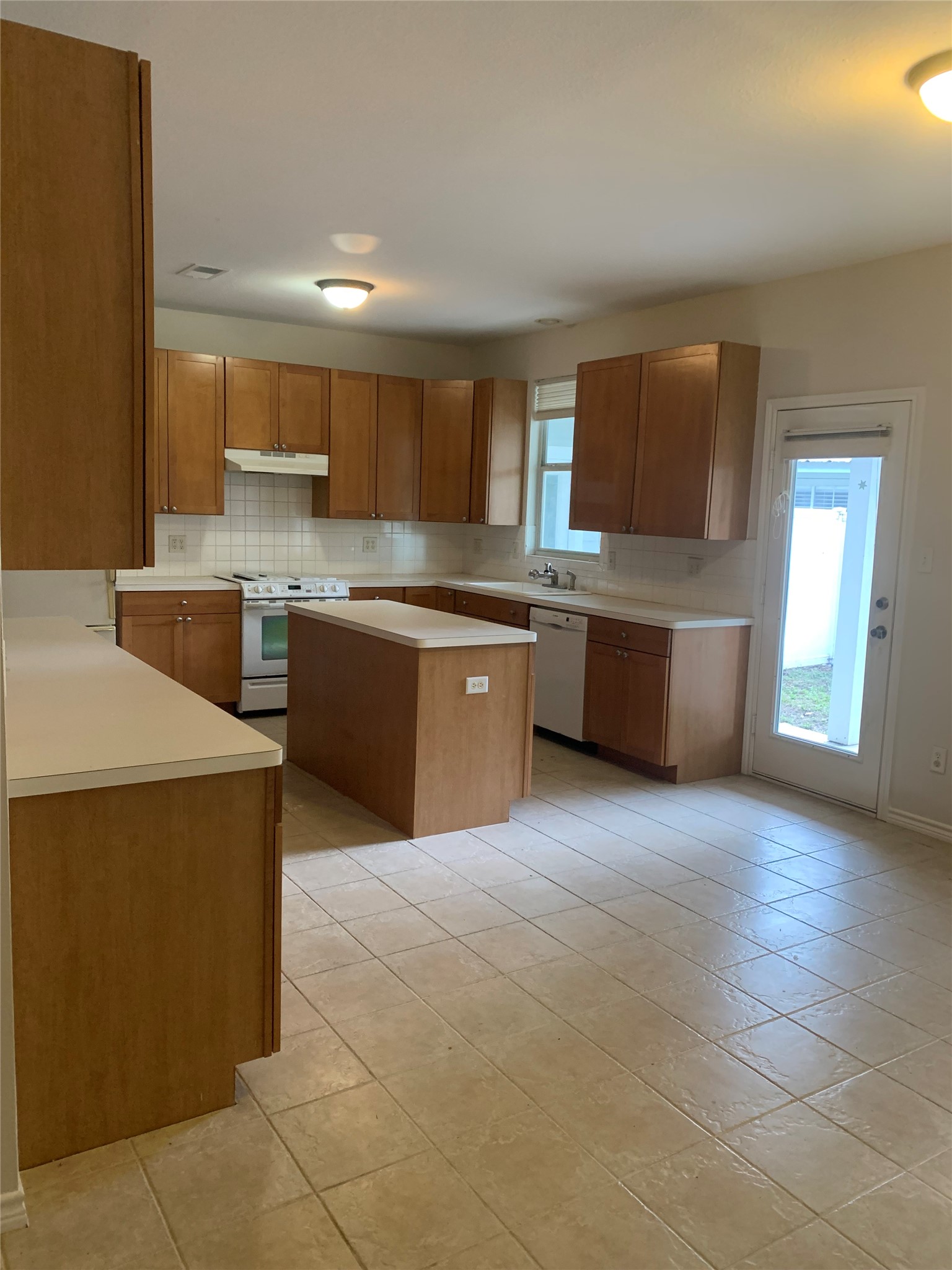11 Lords Circle Coldspring, TX 77331 - Photo 13 of 26 Looking into the kitchen from the hallway going to the bedrooms and going into the living room
