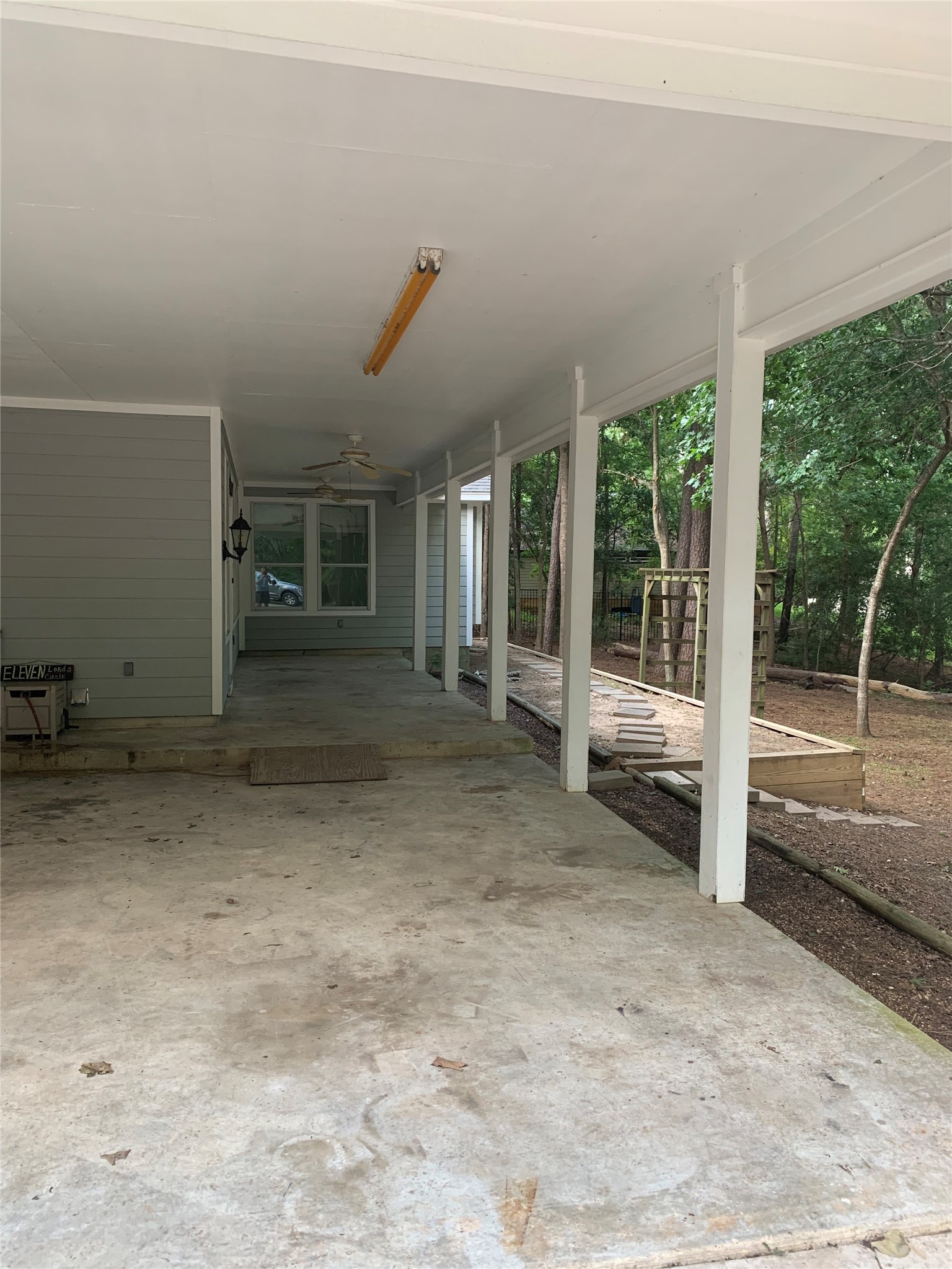 11 Lords Circle Coldspring, TX 77331 - Photo 16 of 26 Entry to the front door, including a nice covered outdoor space