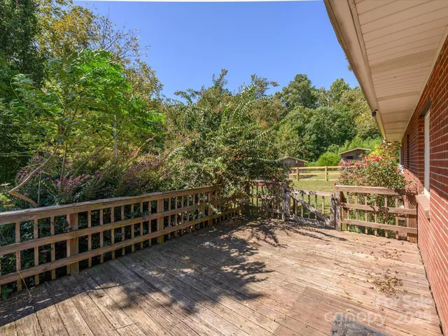 a view of a chairs and table on the wooden floor