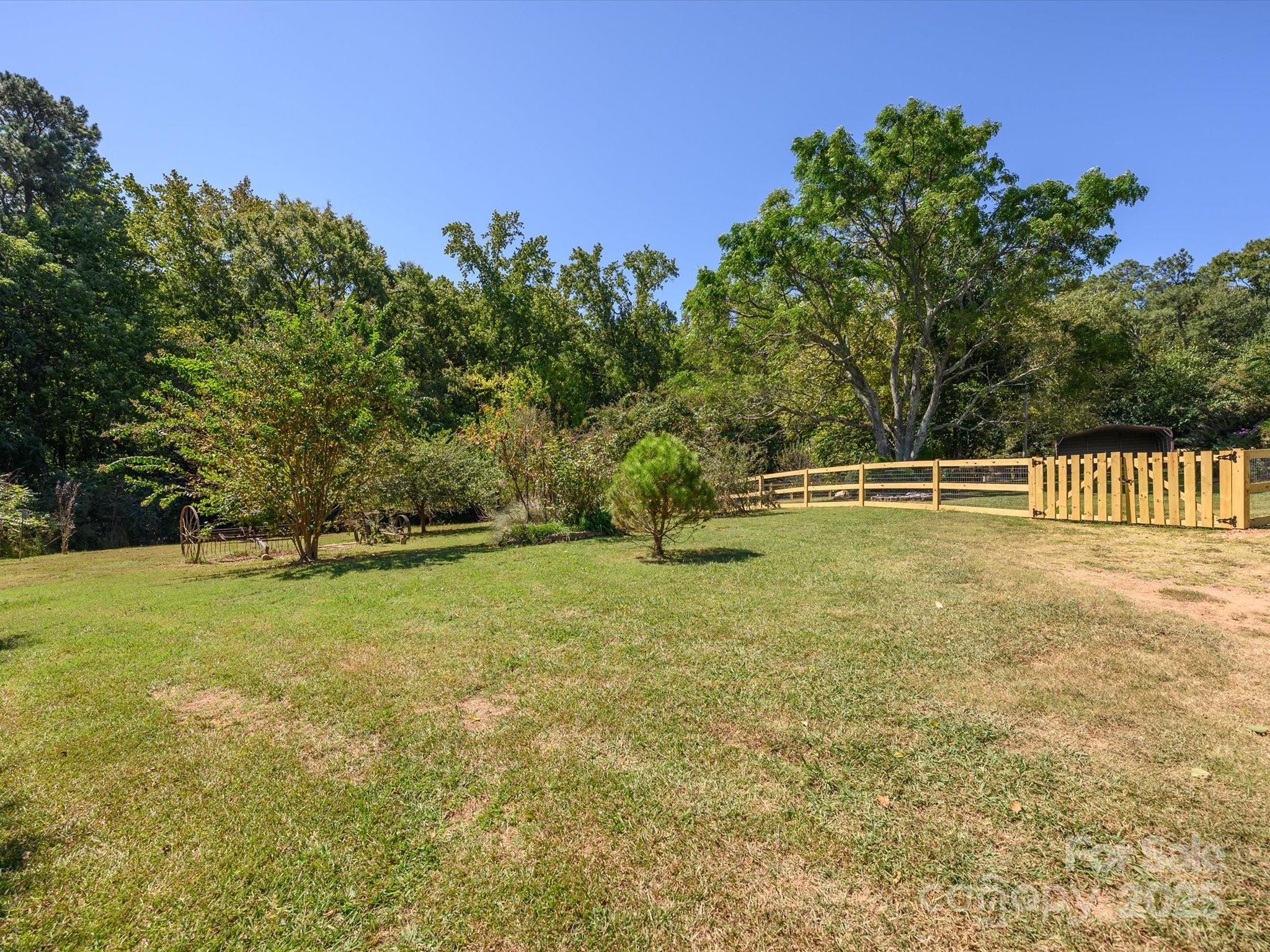 7022 White Store Road Marshville, NC 28103 - Photo 24 of 26 a view of outdoor space with deck and yard