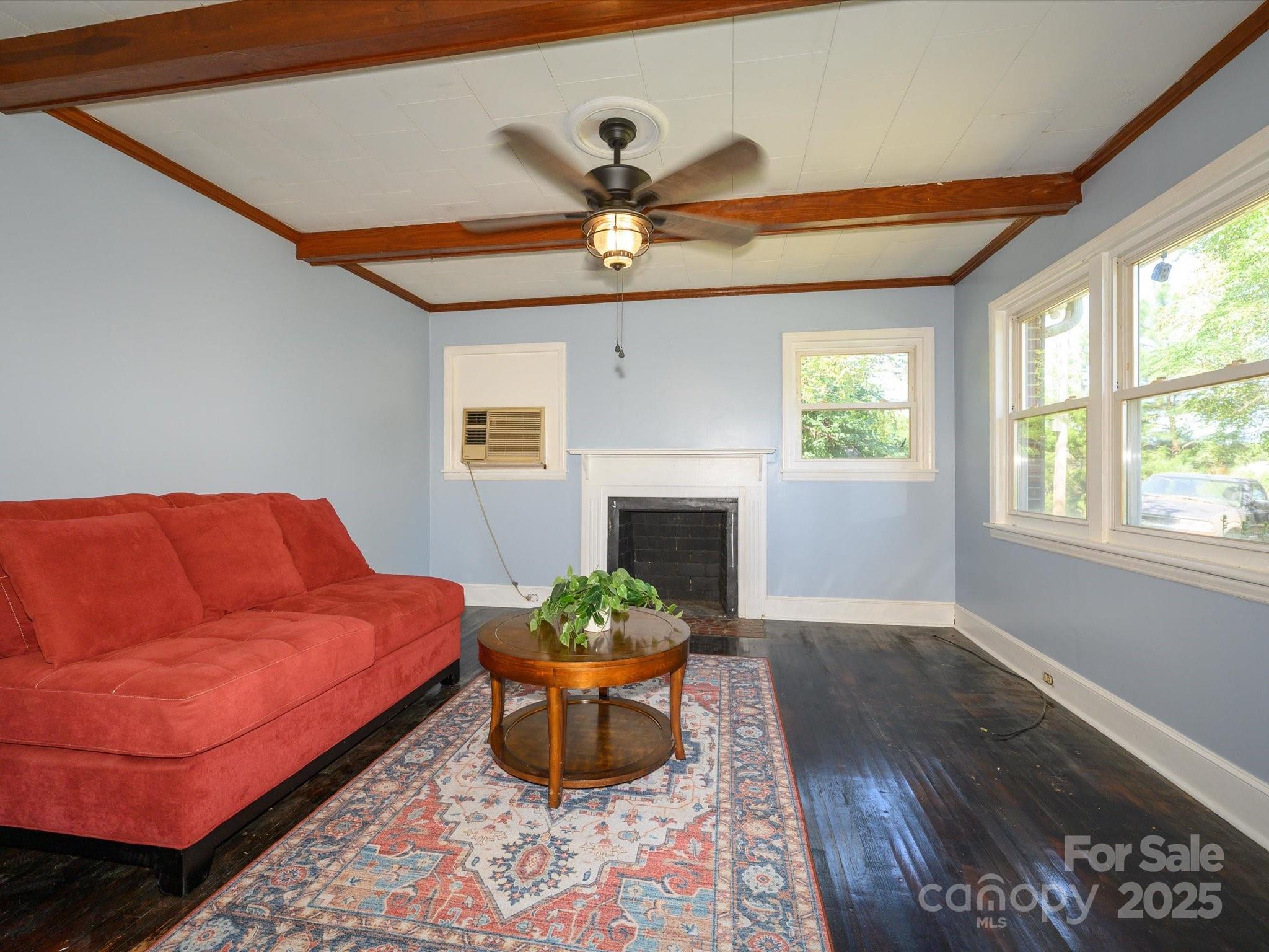 7022 White Store Road Marshville, NC 28103 - Photo 6 of 26 a living room with furniture and a fireplace
