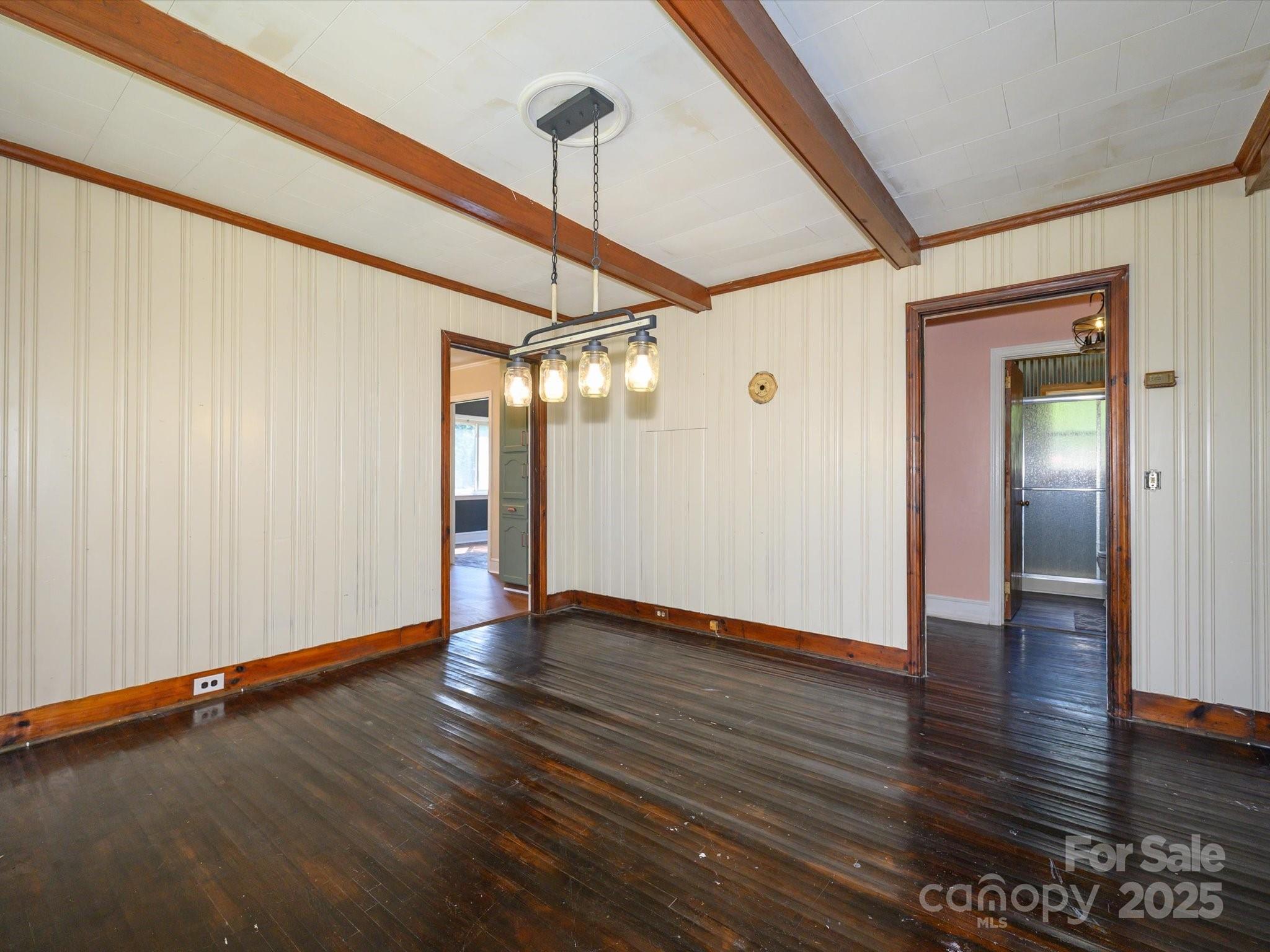 7022 White Store Road Marshville, NC 28103 - Photo 9 of 26 a view of an empty room with wooden floor
