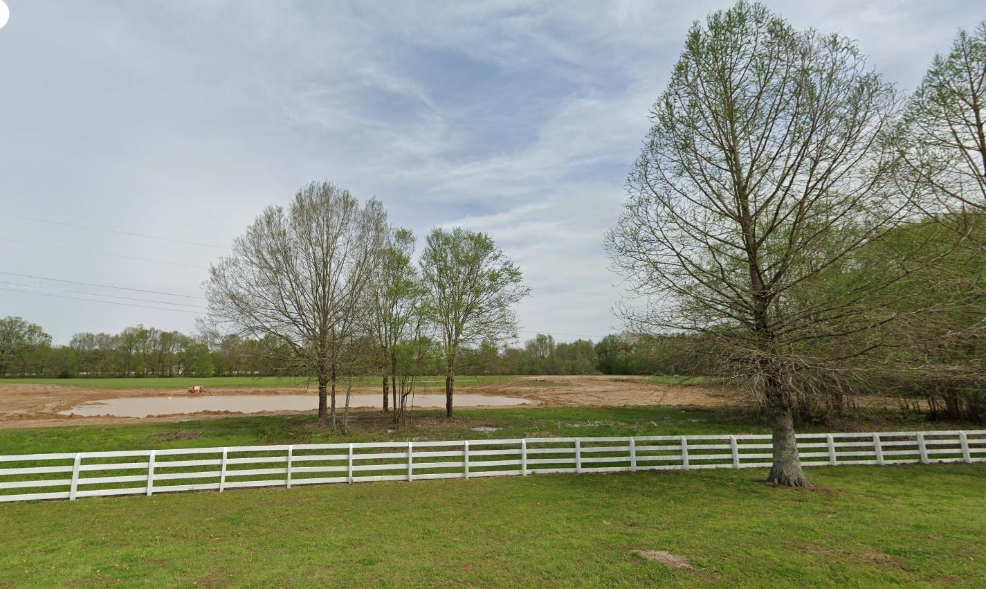 11760 Stable View Drive Eads, TN 38028 - Photo 7 of 8 a view of a lake with a big yard