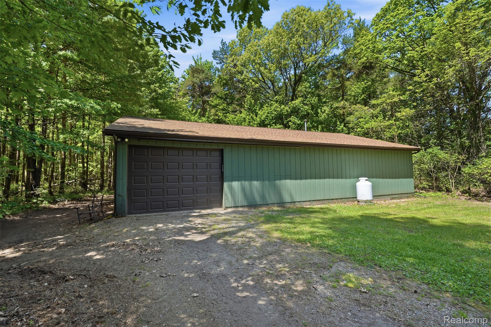 3167 Roods Lake Road Lapeer, MI 48446 - Photo 30 of 38 40X60 Pole Barn with heat, AC and 220 Amp service.